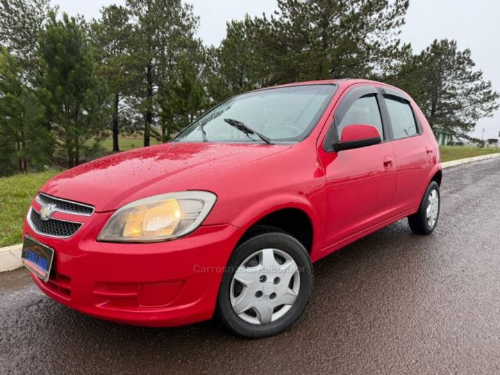 CHEVROLET - CELTA - 2014/2015 - Vermelha - R$ 36.900,00