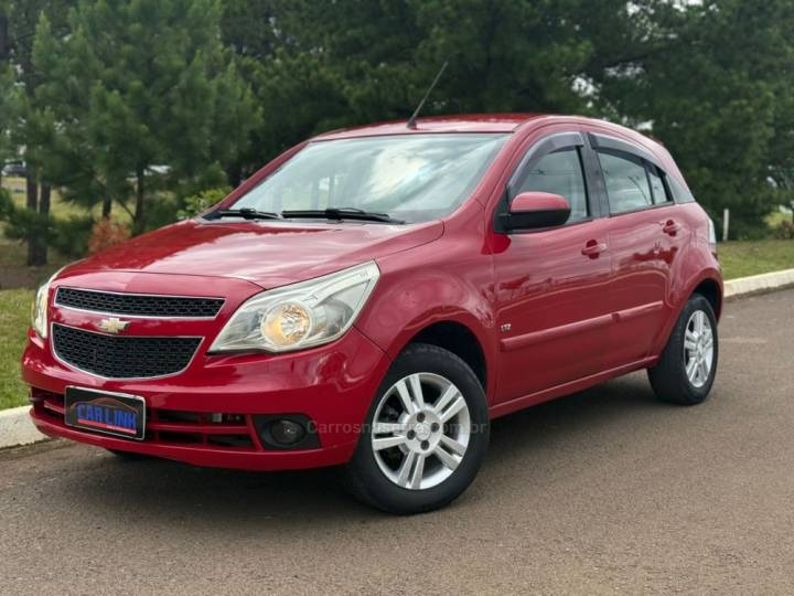 CHEVROLET - AGILE - 2010/2011 - Vermelha - R$ 37.900,00